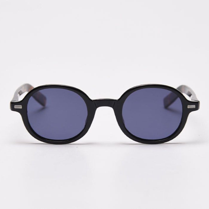 Round sunglasses with black frame and dark lenses on a white background