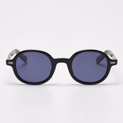 Round sunglasses with black frame and dark lenses on a white background